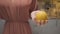 Close-up of woman holding lemon in hand. Action. Beautiful woman holds whole lemon in hand for cooking. Woman holds