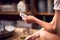 Close Up Of Woman At Home Playing Cards With Friends On Games Night