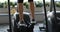 Close up of woman legs, training at racetrack at gym in stylish shoes.