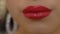 Close-up woman lips with red lipstick. Beautiful perfect lips. Sexy mouth close up. Beautiful wide smile of young fresh