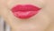Close-up woman lips with red lipstick. Beautiful perfect lips. Sexy mouth close up. Beautiful wide smile of young fresh