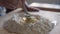 Close Up. Woman Mixing eggs into Flour, Making Dough at Home in a Kitchen. Slow Motion