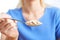 Close Up Of Woman With Oats On Spoon