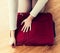 Close up of woman packing travel bag for vacation