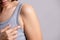 Close up woman pointing her skin underarm. problem armpit fat skin concept