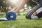 close up woman rolling yoga mat after working out