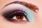 Close-up of woman\'s eye with creative make-up