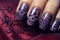 Close up of woman\\\'s fingernails with Halloween nail art