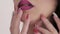 Close up of woman\'s hands touching friable soft lips. Slowly