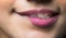 Close-up of woman\'s lips with fashion natural rose lipstick makeup