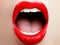 Close-up of woman`s lips with fashion red make-up. Beautiful female mouth, full lips with perfect makeup