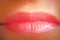 Close-up of woman\'s lips. Horizontal macro