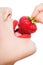 Close up of woman\'s mouth eating strawberry