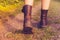Close up on woman\'s muddy boots
