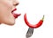 Close up of woman\'s tongue and capsicum