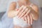 Close-up Woman showing her hands with beautiful manicure.Bride`s hands with a nice manicure.