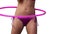 Close up of a woman spinning a hula hoop around her waist