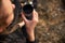 Close Up Of Woman Taking A Break From Countryside Hike And Drinking Coffee From Flask