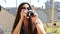 Close up of woman taking photos with old fashioned camera