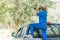 Close up Woman wear hat and hold binocular in grass field