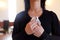 Close up of woman with wipe at funeral in church