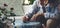 Close up of woman at work paiting with blue and mandala concept an old footstool at home sitting outside. Female people in hobby