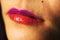 A close up of a womans bi-colored lips