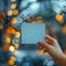 Close up Womans hand holding small blue paper with bokeh backdrop