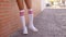 Close Up Of Womans Legs In White Knee-High Socks