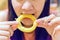 Close-up of a women eating a onion ring