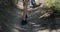 Close up of women legs hiking forest path