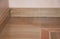 Close up on wooden batten repair on oak wood parquet installation