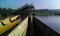 Close up wooden boats dock in front of the bridge in Rawa Pening Rawapening lake, beautiful landscape tropical climate