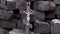 Close up for the wooden cross with crucified Jesus on stone bricks background, Bible and religion concept. Footage