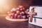 Close-up of  wooden cross hang on holy bile  over grape on wood plate