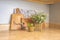 Close up of wooden cutting boards and potted plants inside the kitchen of a home