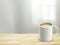 Close up of wooden desk and coffee in room