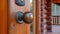A close up of a wooden door with an ornate handle, AI