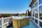 Close-up of wooden hot tub. Luxury house exterior.