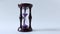 Close-up wooden hourglass clock with violet sand on a white background