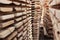 Close-up of wooden planks. Lumber warehouse. A photo with perspective. The background of the boards.