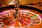 Close up of wooden roulette in casino, selective focus