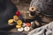 Close-up of wooden sewing spool and buttons set on wooden table