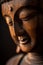 Close Up of a Wooden Statue of Buddha
