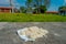 Close up of a wool drying in the sun, over a stoned patio, whool shawl clothing in Nepal