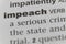 Close up of the word impeach
