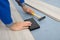 Close-up of a worker assembling laminate floor