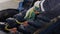 Close up of a worker changing spark plugs of a truck at the repair center. Scene. Mechanic performing technical