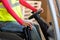 Close up of worker is driving a pallet truck