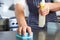 Close Up Of Worker In Restaurant Kitchen Cleaning Down After Service